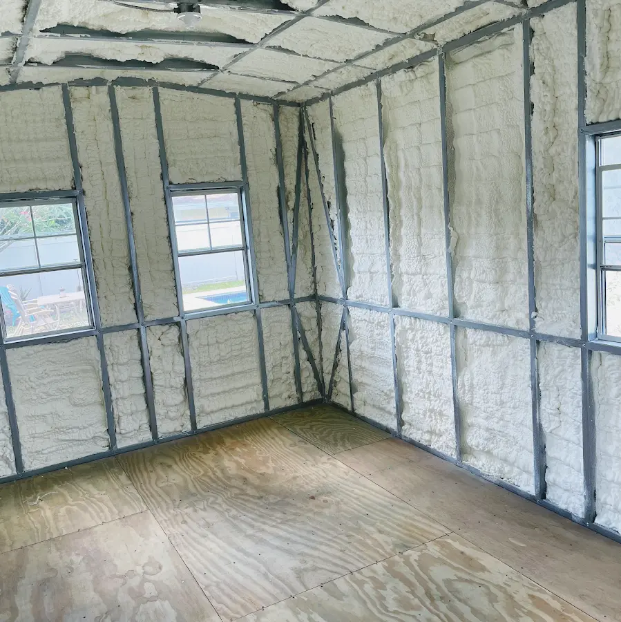 Closed-cell spray foam insulation applied to wall cavities in a residential project in Sweetwater